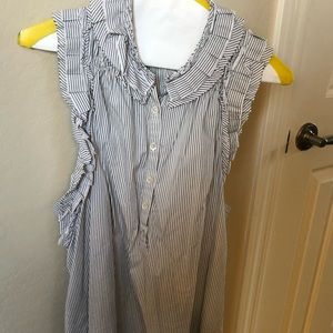 Cute blouse with ruffle around neck and shoulders